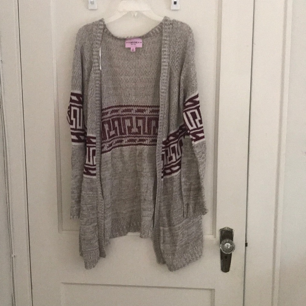 Cardigan; longer in length